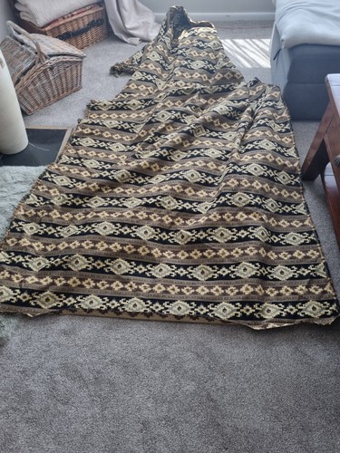 Brown aztec material - /,