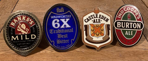 Four original metal beer pump