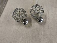 Curtain pole finials sliver