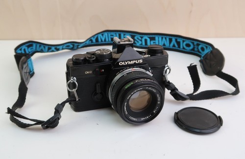 Olympus black 35mm film - olympus,