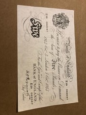 WHITE 5 POUND NOTE. SERIAL NO: E29 062047.