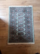 green hand-knotted Bokhara