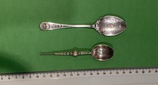 Two decorative collectable silverware teaspoons