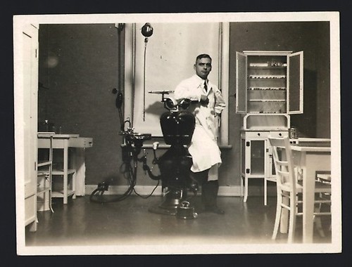 Photograph dentist in his - in,