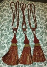 Curtain tie backs x 3  red