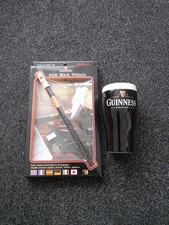 GUINNESS ceramic money box and Irish Whistle