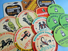 Fourteen nostalgic BULMER'S WOODPECKER CIDER branded coaster beer mats