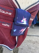 Travel rug buckle guards