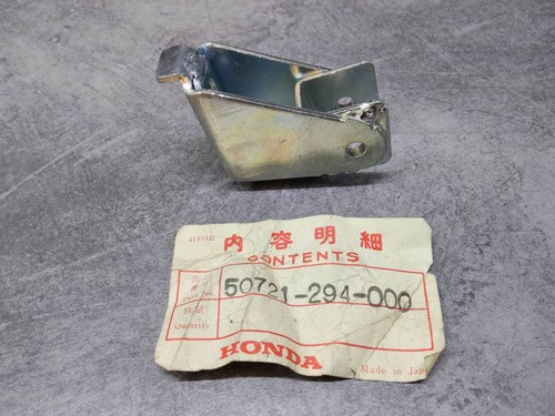 Left rear footrest - rear,