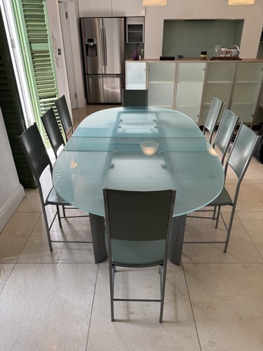 Oval glass dining table and - glass,