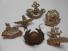 lot C   FIVE COLLAR BADGES