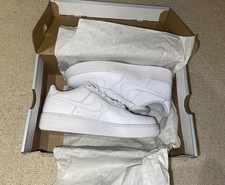 White Nike air force 1s low