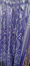 PURPLE ASSUIT PRINT TRIBAL