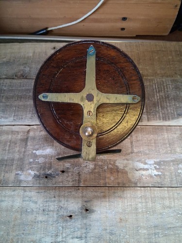 Wooden and brass centerpin - and,