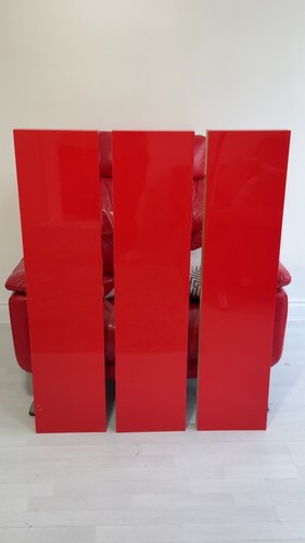 Gloss red floating shelves