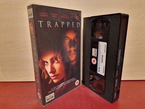 Trapped charlize theron - trapped,