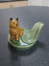 A Vintage Wade Cairn Terrier Pipe Stand Dog Figurine