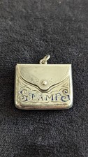 Antique hallmarked 1920 silver stamp case pendant with enamel detail