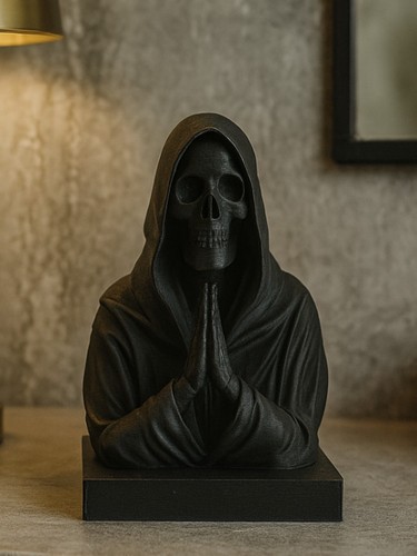 Grim reaper praying statue - praying,
