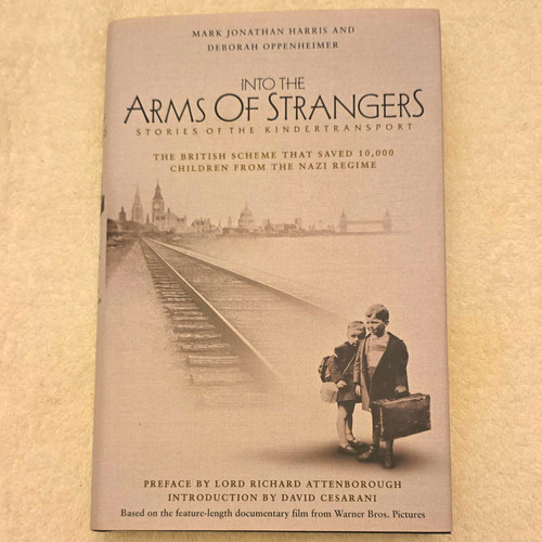 Into the arms strangers - into,