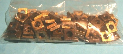 One hundred meccano brass - one,