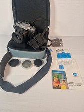 Minolta XG-M 35mm SLR Film Camera + MD 50mm Lens + Case And Manual Includes Case
