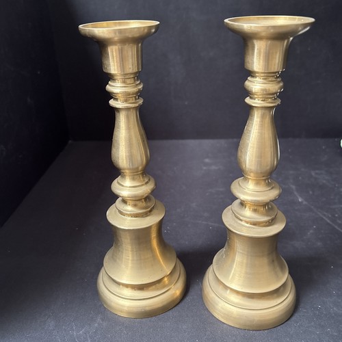 Pair brass candlesticks - a, of
