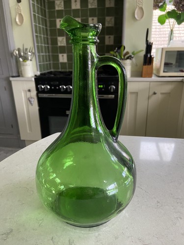 Vintage green glass pouring
