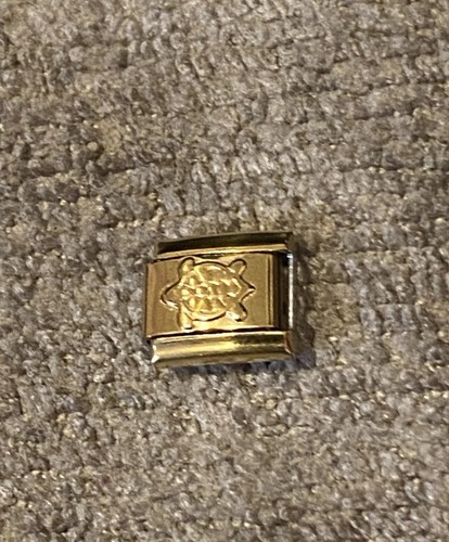 New gold sea turtle - new,
