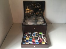 sewing box containing lots of sewing accessories
