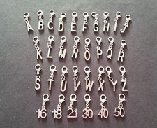 Clip dangle charms initial - on,