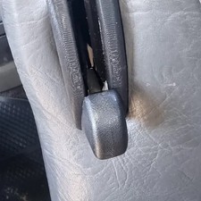 Seat folding system cover -