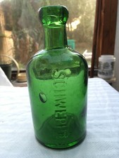 SCHWEPPES green dumpy seltzer