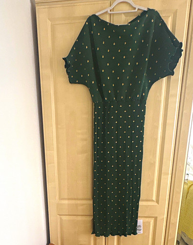 Never fully dressed green - never,