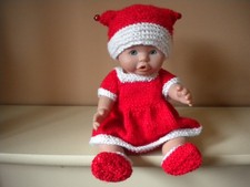 Hand knitted doll's clothes
