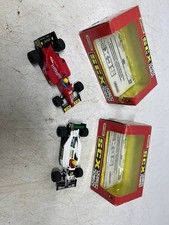 Scalextric  style Slot Cars SCX Minardi and Ferrari F1 1995