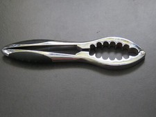 Silver Metal Nut Crackers 17.5cm x 4cm x 1.5cm. Total length open 33.5cm.