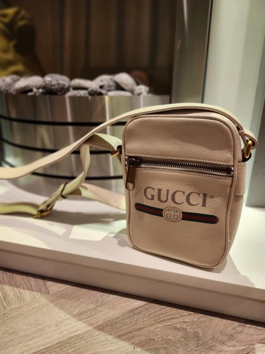 Gucci logo print grained calf - gucci,