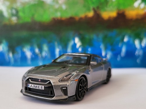 Nissan 2017 grey - grey, 1:43