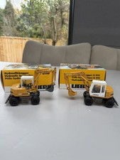 2 Liebherr 310 Rubber Duck