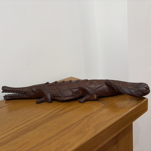Hand carved wooden crocodile - hand,