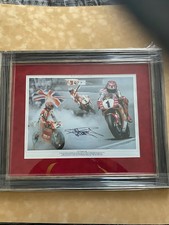 World Superbike Legend Carl Fogarty signed montage framed 23 in x 19 in.