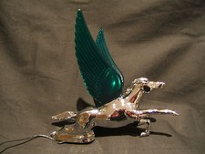 FLYING HORSE WITH GREEN LIGHT