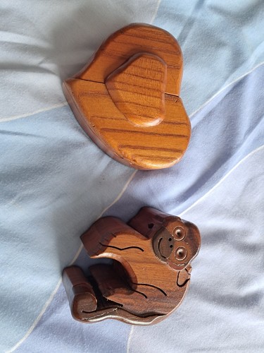 Two wooden puzzle boxes - puzzle, one
