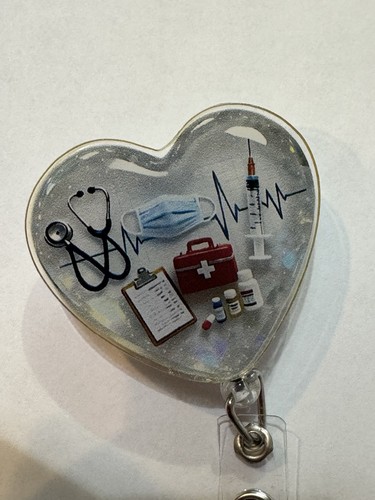 Retractable badge reel - retractable,