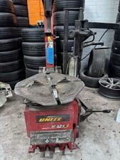 UNITE U226-A TYRE MACHINE WITH ASSIST ARMS and U - 820 WHEEL BALANCER 