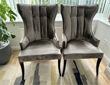 Custom made handsome pair of statement patterned arm chairs In velvet material