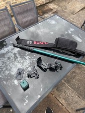 Bosch quigo self leveling Red Cross laser and TP 320 telescope pole with bracket