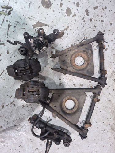 Front suspension parts - b,