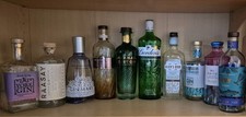 10 Empty Gin Bottles for Recycling Rinsed and dried out.